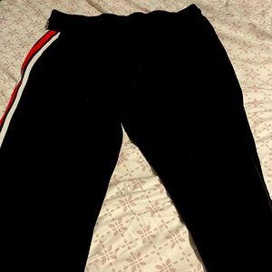 Ardene black sweatpants with red white stripe